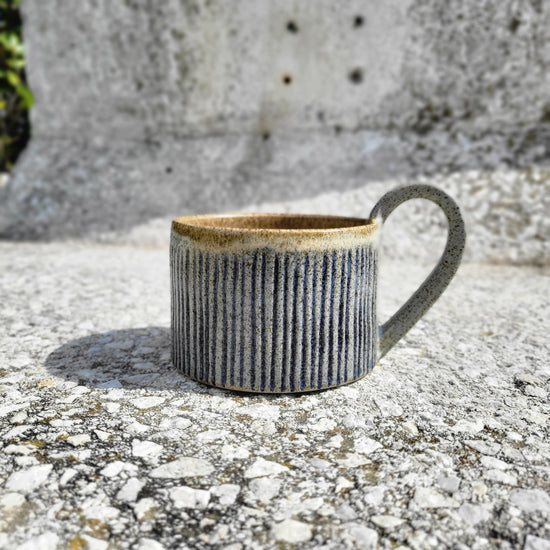 Cup with blue stripes