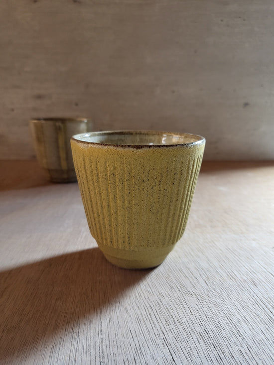 Yellow tumbler