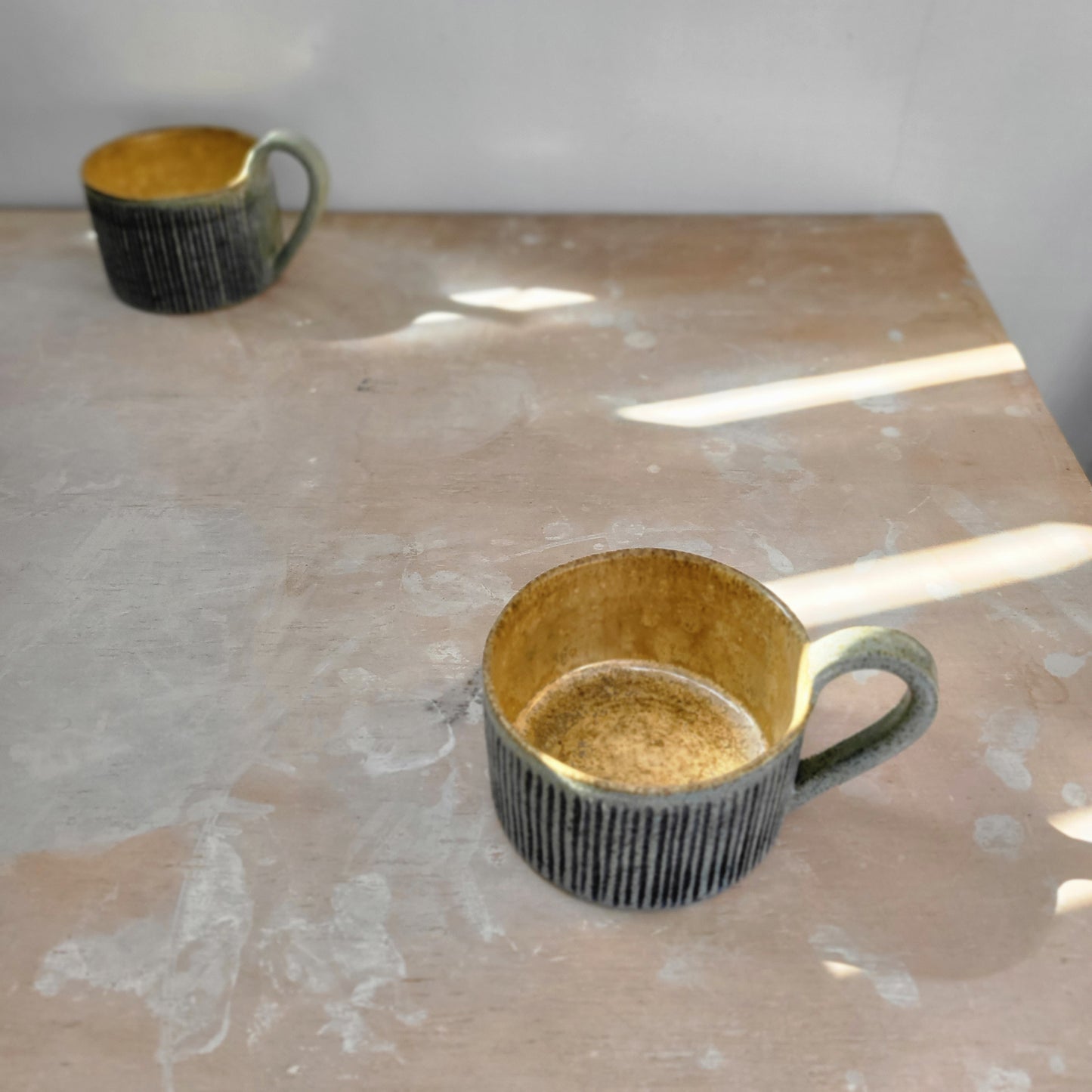 Cup with blue stripes