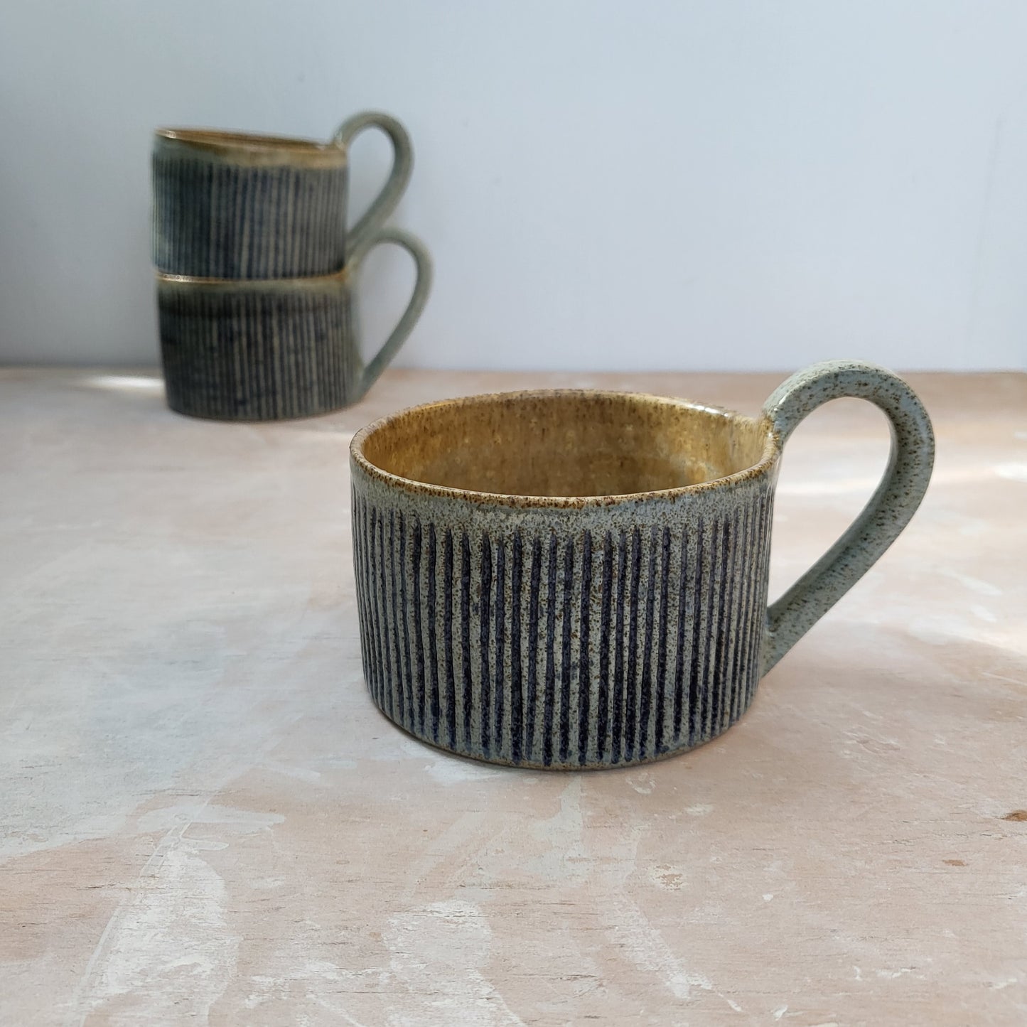Cup with blue stripes