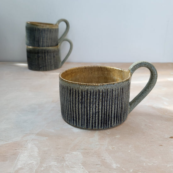 Cup with blue stripes