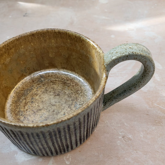 Cup with blue stripes
