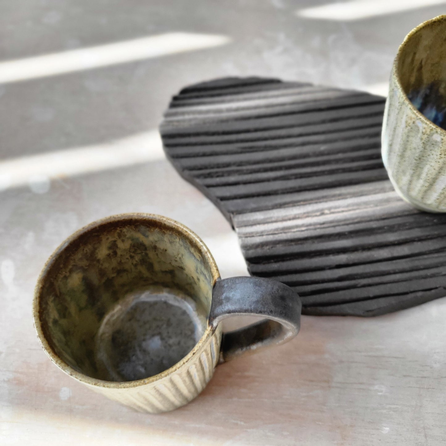 Handmade ceramic cup. Perfect for your morning coffee.